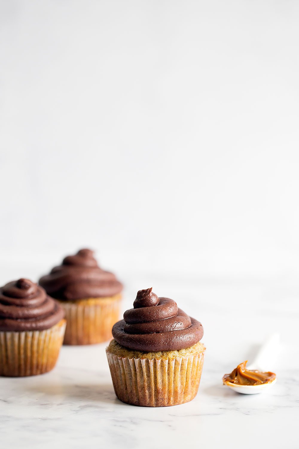 Dulce de Leche Banana Cupcakes with Chocolate Frosting are out of this world moist and flavorful!