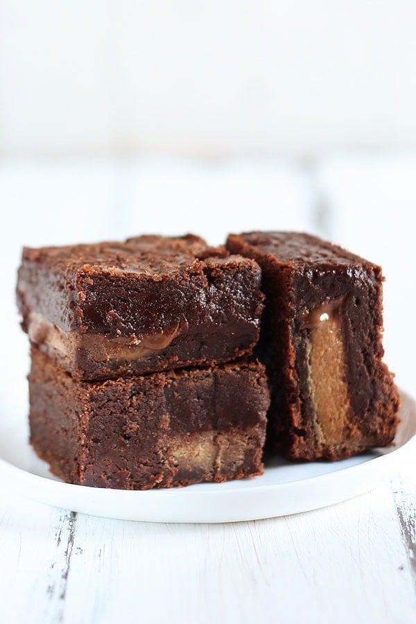 These are the BEST peanut butter brownies ever! They have peanut butter throughout AND are stuffed with peanut butter cups! Thick, fudgy, chewy, and slightly gooey.