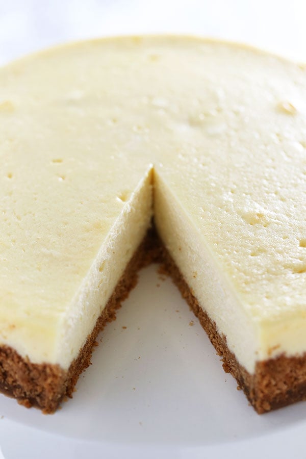 Stop right here! This is the ULTIMATE Cheesecake recipe! It took lots of testing to get a perfectly smooth and tangy cheesecake with NO CRACKS. This ones a keeper.