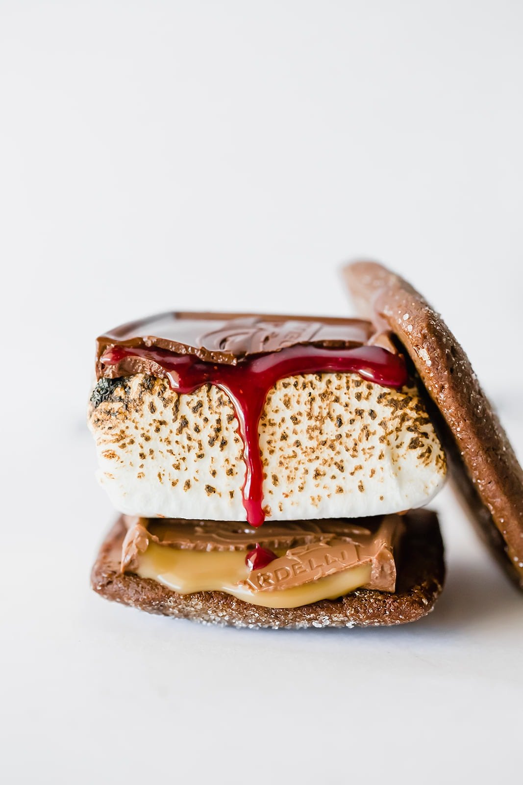 Double chocolate s'mores made with homemade chocolate graham crackers and Ghirardelli chocolates!