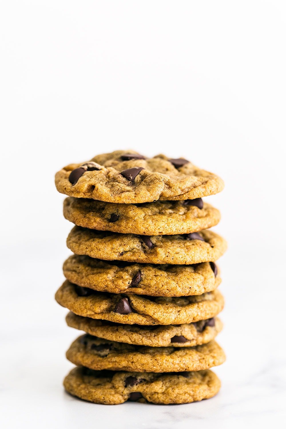 Brown Butter Pumpkin Chocolate Chip Cookies are CHEWY (not cakey) pumpkin spice cookies loaded with tons of caramelized butterscotch flavor and gooey chocolate chips. A fall favorite!